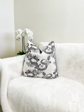 Cream and black dragon with throw
