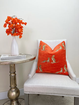Orange embroidered Cheetah chair 2ith orange flowers