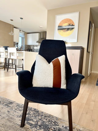 off white boucle and leather blue chair