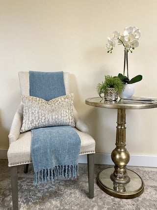 oyster and gold chair