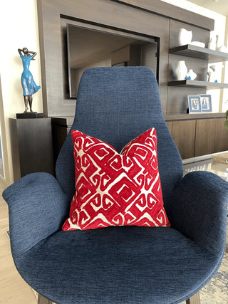 red pillow blue chair