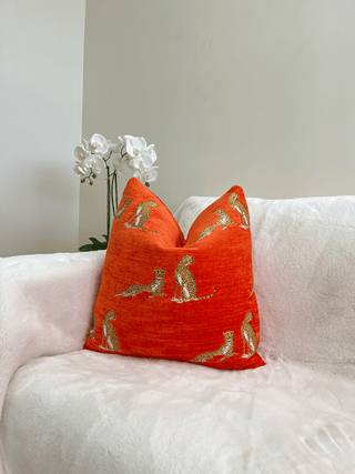 Orange embroidered Cheetah couch 2