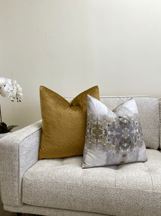 gray gold medallion with gold pillow